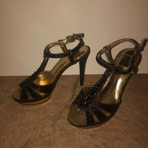 Black and gold high heels